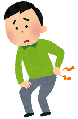 腰を押さえる男性