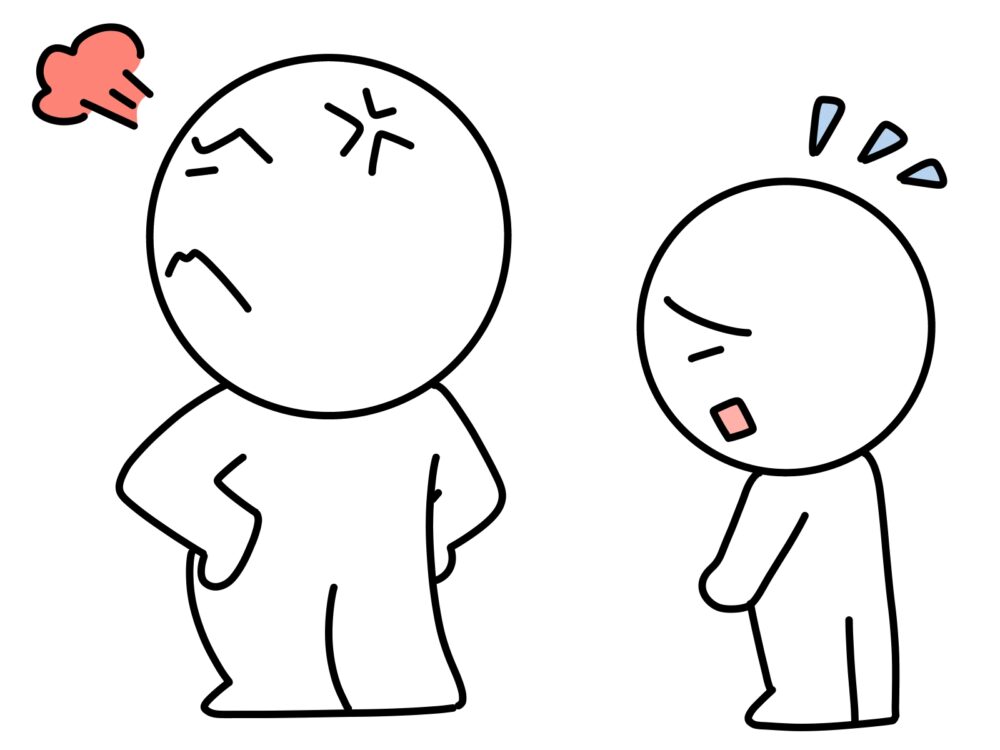 怒っている人に誤っている人物