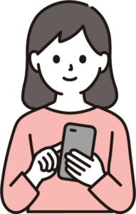 スマートフォンを操作する女性