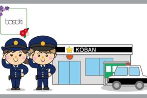 女性と男性の警察官と、交番
