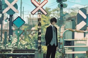 線路に佇む男性