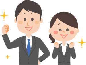 ガッツポーズをするスーツ姿の男女二人