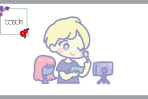 メイクをする男性