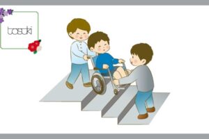 車椅子の男の子を配慮する、二人の男の子