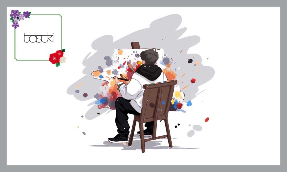 絵を描く男性の後ろ姿