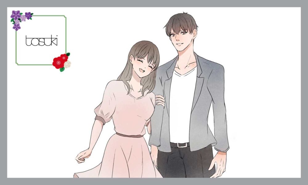 男性の腕を持って、笑顔の女性