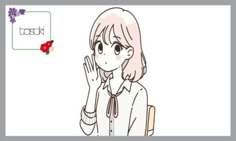 耳に手を添える、耳が聞こえない女性