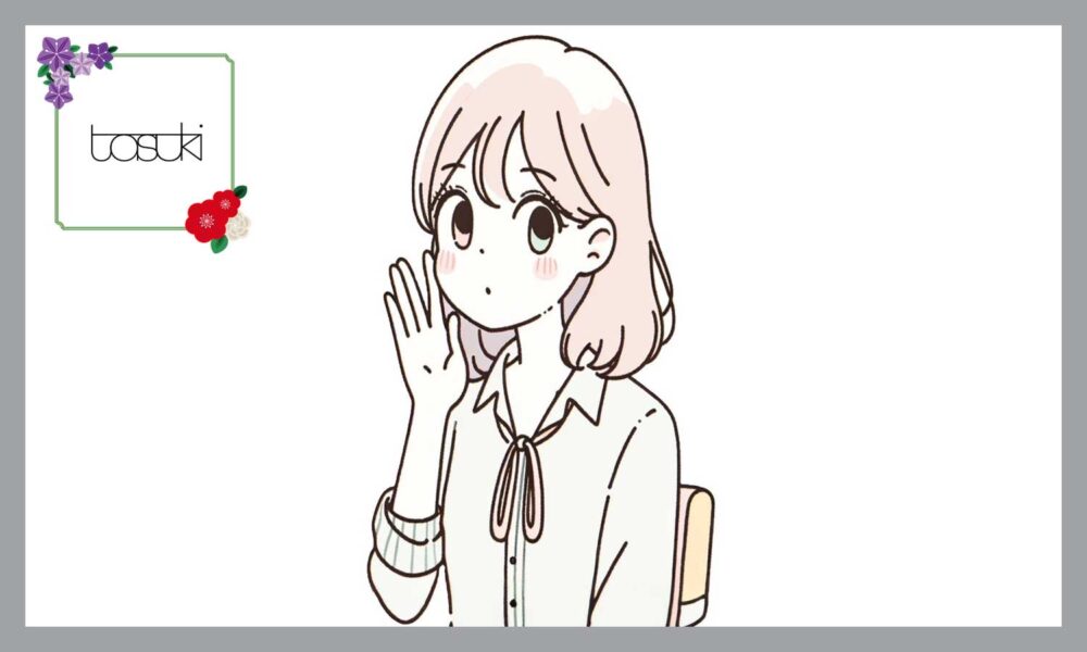 耳に手を添える、耳が聞こえない女性