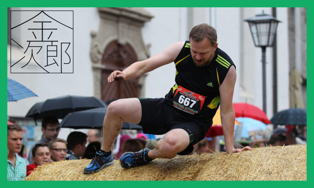 障害物を乗り越える陸上選手